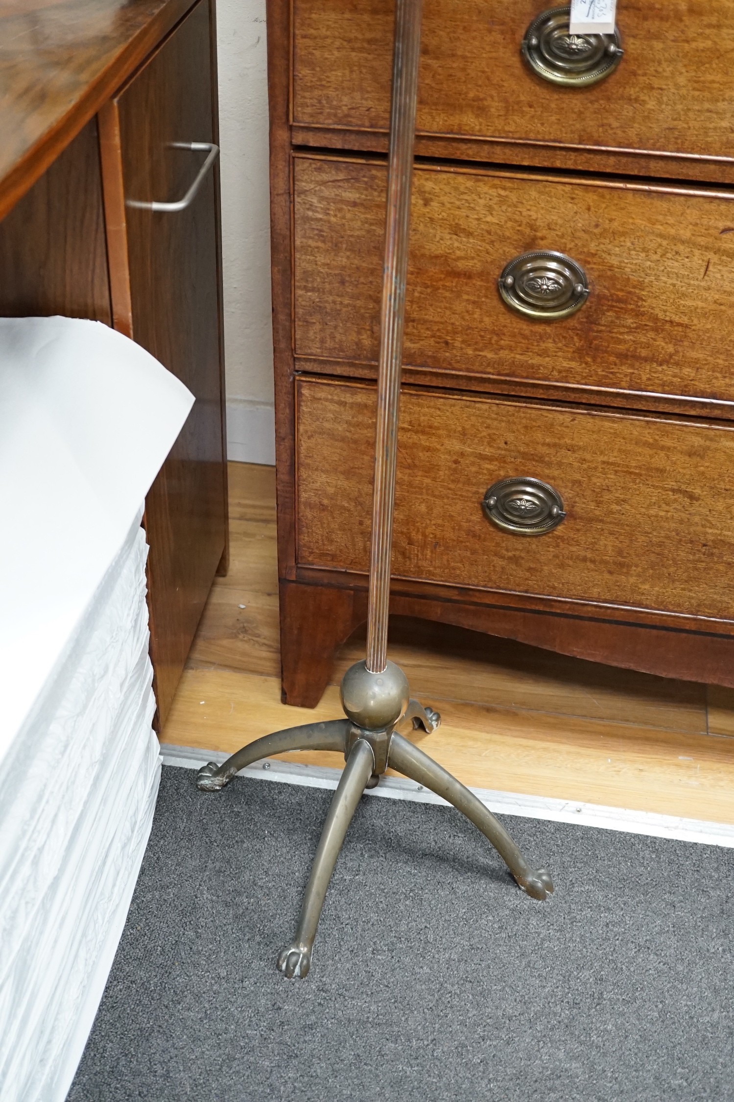 A 1920's brass and copper oil lamp standard converted to electricity, height overall 161cm *Please note the sale commences at 9am.